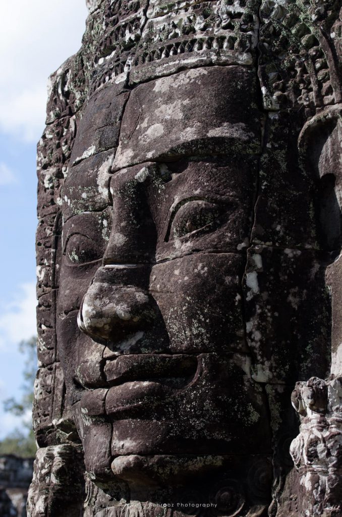 Giant stone face of Lokeshvara, Bayon Temple of Angkor Thom