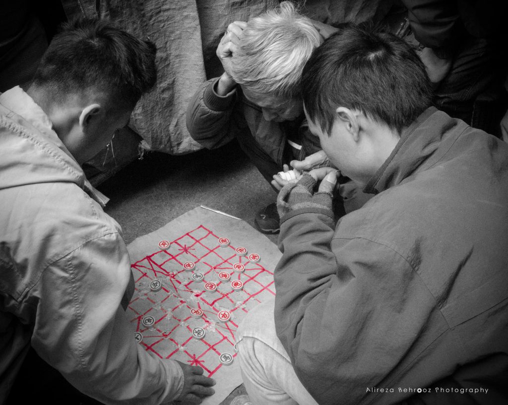 Playing  xiangqi on the streets of Old Quarter, Hanoi, Vietnam